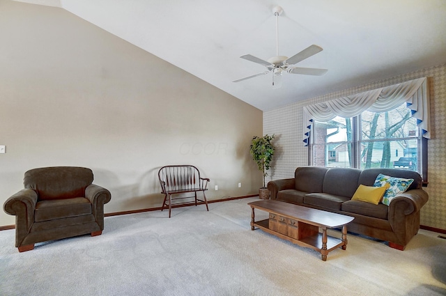 living room featuring light carpet, ceiling fan, vaulted ceiling, and baseboards