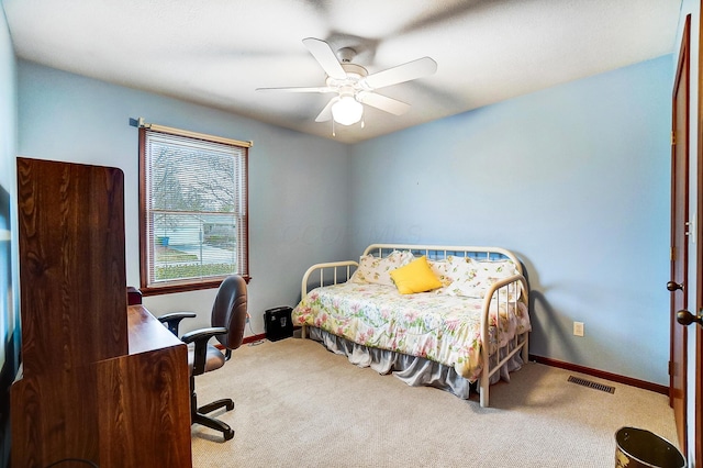 bedroom with light carpet, visible vents, baseboards, and ceiling fan