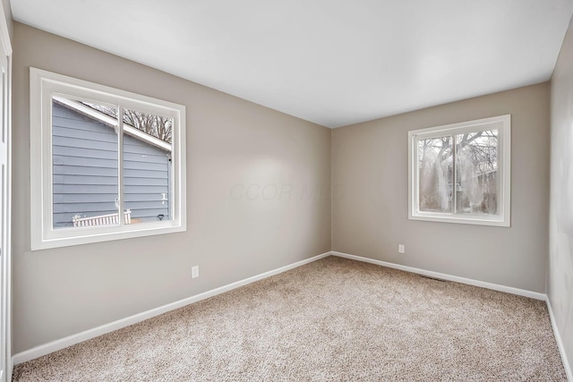 view of carpeted spare room