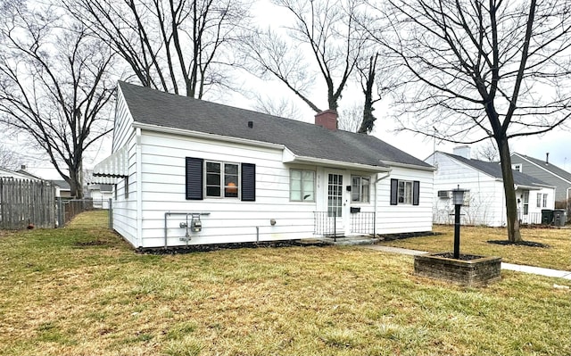 view of front of house with a front lawn