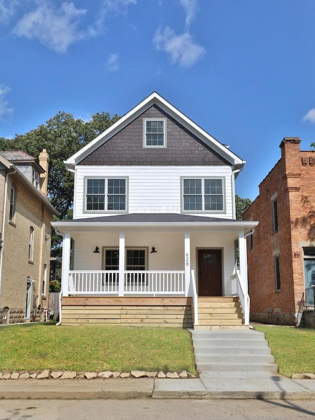 view of front of home with a front yard