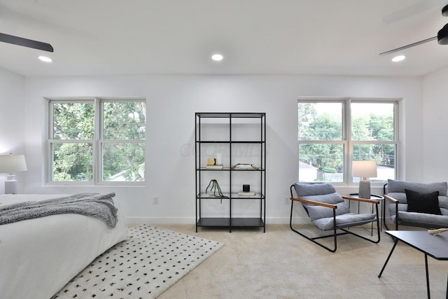 bedroom featuring light carpet