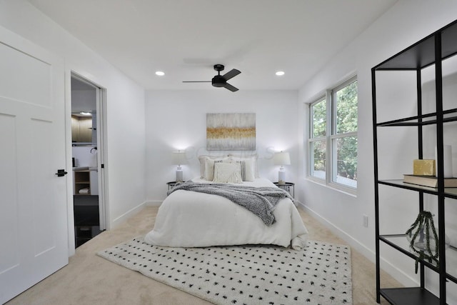 carpeted bedroom with ceiling fan