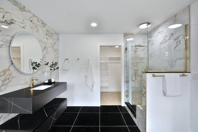 bathroom with vanity, tile patterned floors, and walk in shower