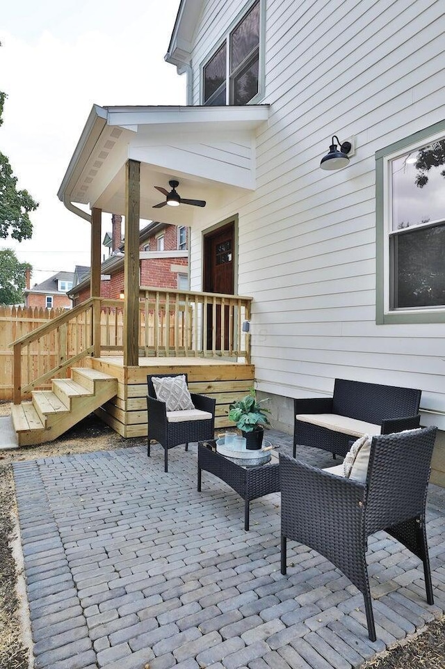 view of patio featuring an outdoor hangout area, a deck, and ceiling fan