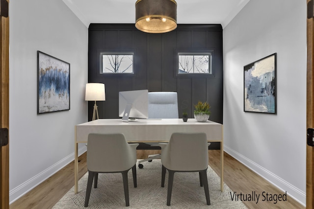 office with light wood-type flooring