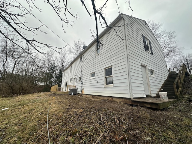 view of property exterior with central air condition unit