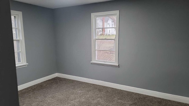 spare room featuring carpet flooring