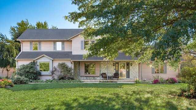 view of front of home with a front yard