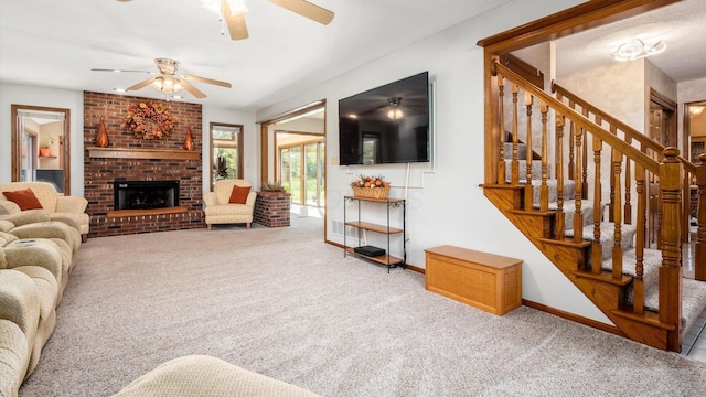 carpeted living room with ceiling fan and a brick fireplace