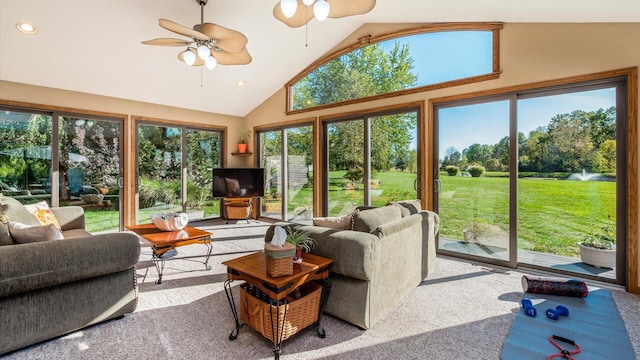 sunroom / solarium with vaulted ceiling and ceiling fan