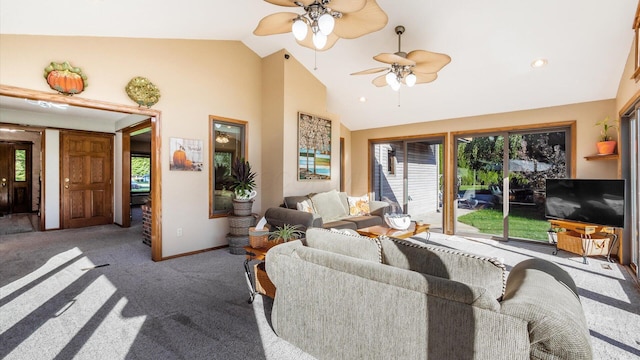 carpeted living room with high vaulted ceiling and ceiling fan