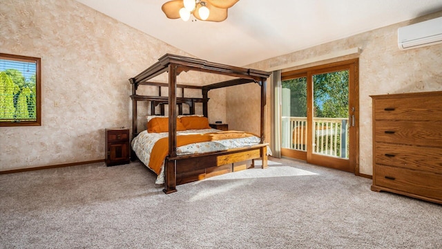 carpeted bedroom featuring access to exterior, vaulted ceiling, multiple windows, and an AC wall unit