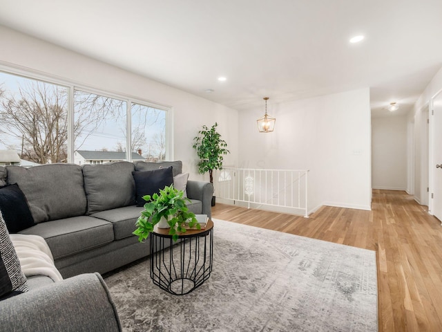 living room with light hardwood / wood-style flooring