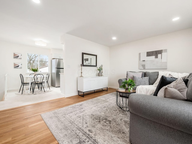 living room with hardwood / wood-style flooring