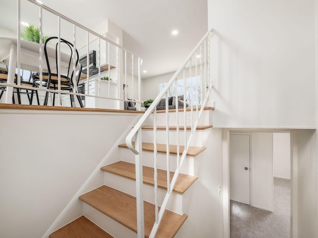 stairs with carpet floors