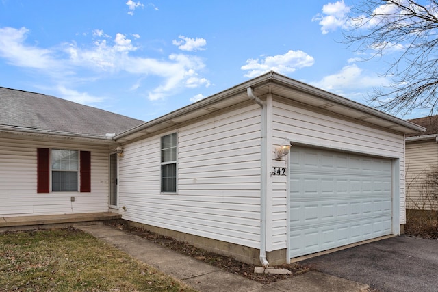 view of home's exterior featuring a garage