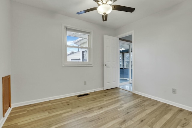 unfurnished room with light hardwood / wood-style floors and ceiling fan