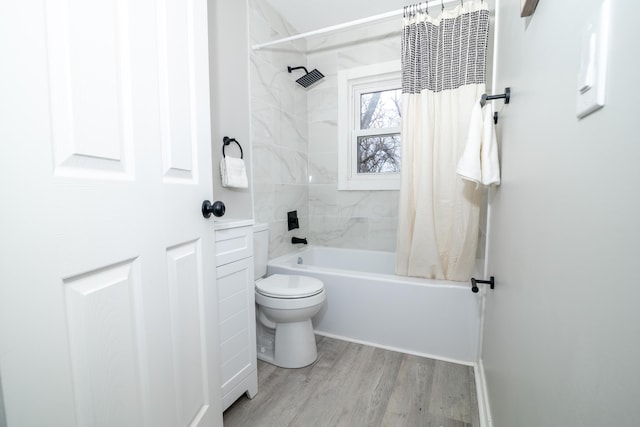 bathroom featuring wood-type flooring, toilet, and shower / bath combo