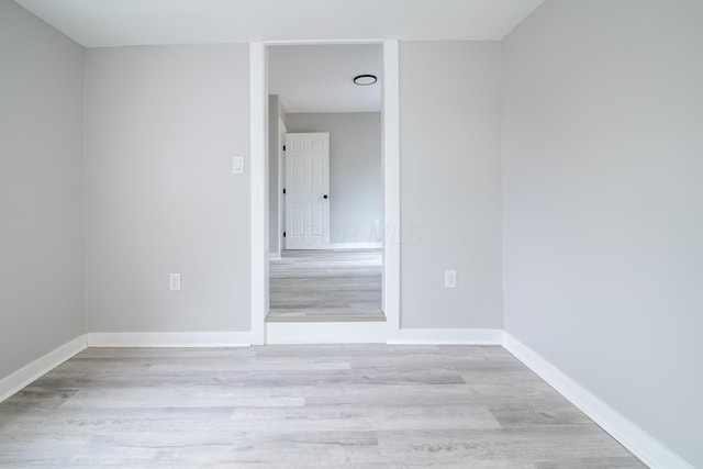 unfurnished room featuring light hardwood / wood-style floors