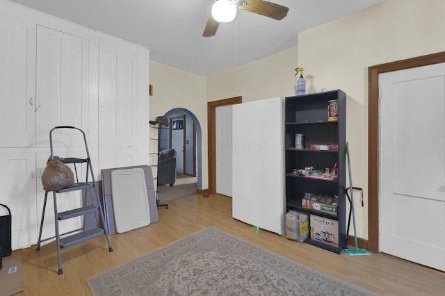 interior space featuring light hardwood / wood-style floors and ceiling fan