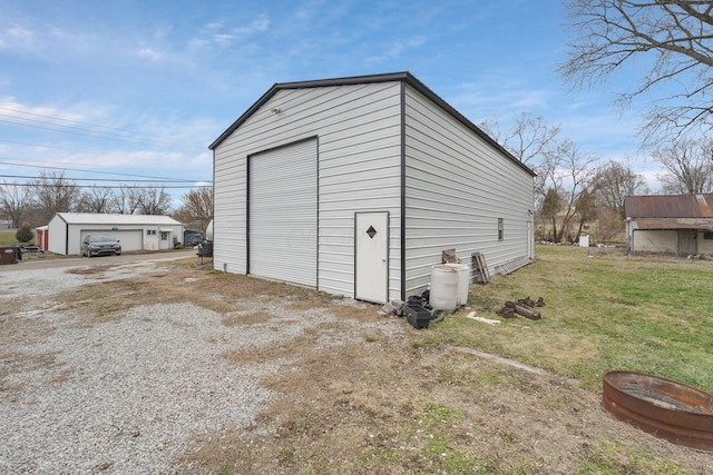 garage with a lawn