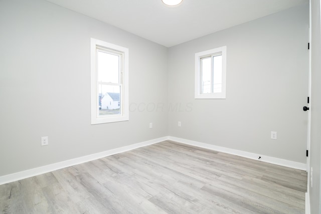 empty room featuring light hardwood / wood-style floors