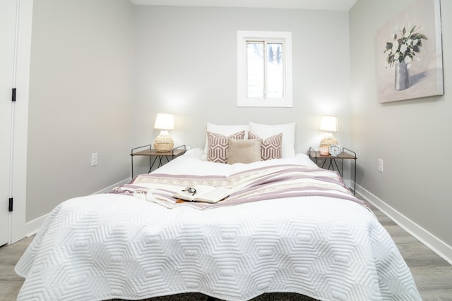 bedroom featuring hardwood / wood-style flooring