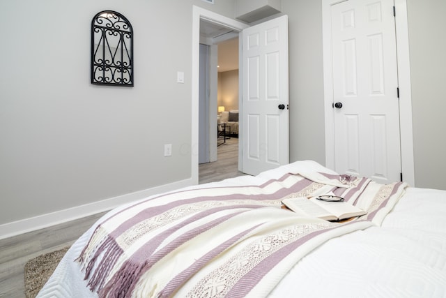 bedroom featuring light hardwood / wood-style flooring