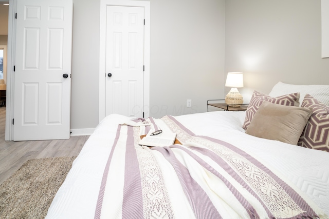 bedroom featuring light wood-type flooring