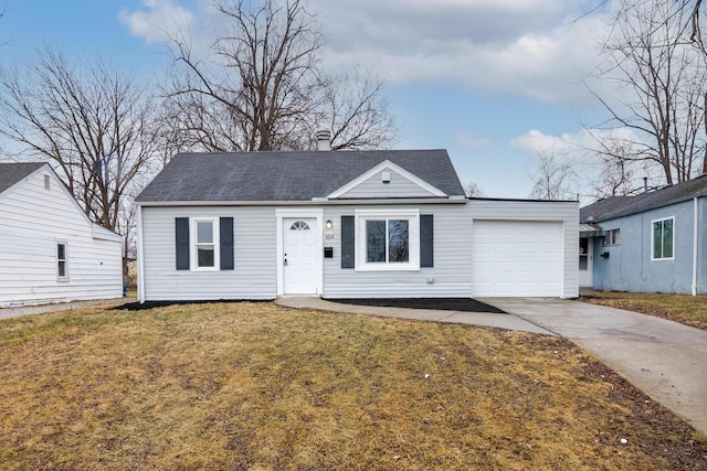 view of front facade featuring a garage and a front lawn