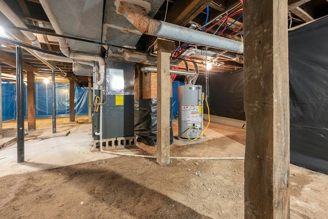 basement with water heater and heating unit