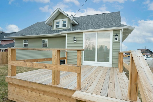 rear view of property with a deck