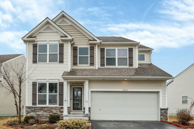 craftsman-style house featuring a garage