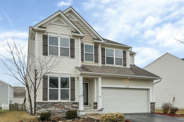 craftsman-style house featuring a garage