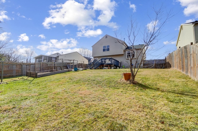 view of yard with a wooden deck