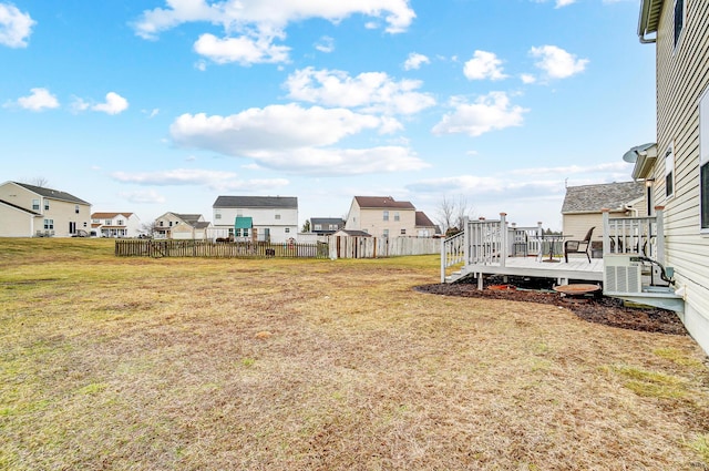 view of yard with a wooden deck