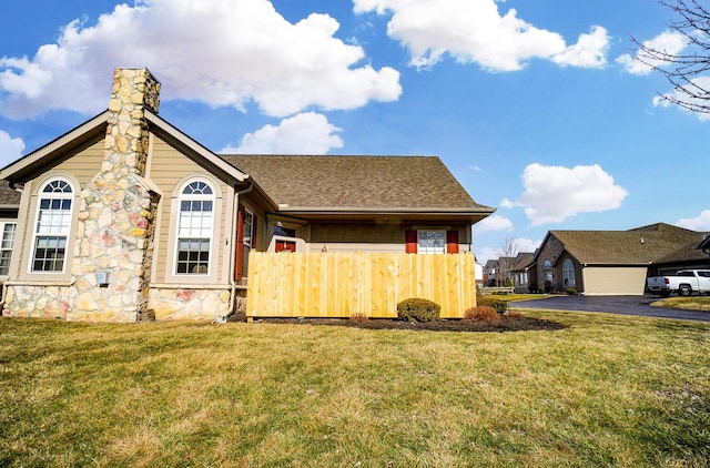 exterior space with a front yard