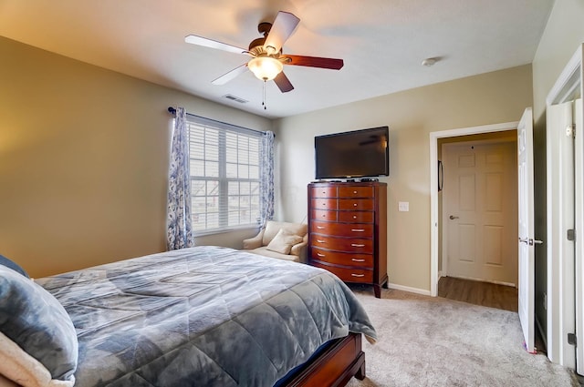 carpeted bedroom featuring ceiling fan