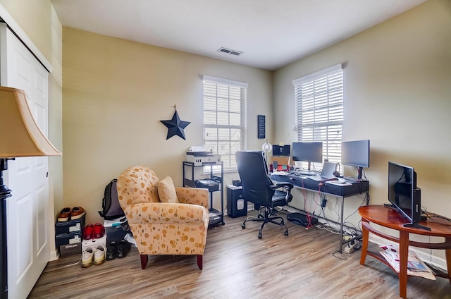 office with wood-type flooring