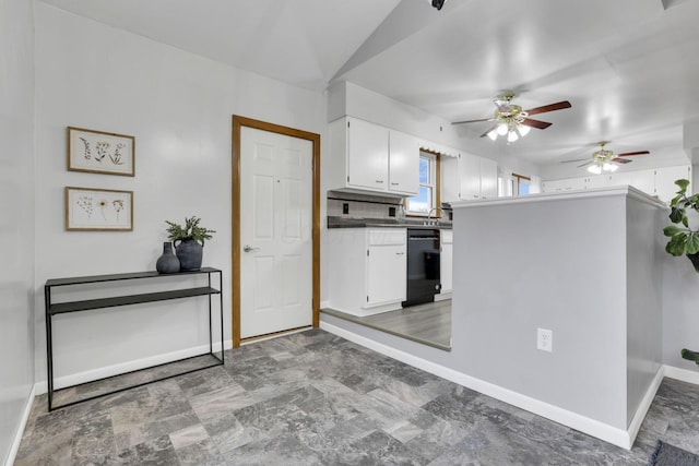 kitchen with white cabinetry, dishwasher, sink, and decorative backsplash