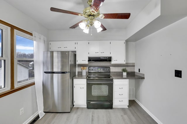 kitchen featuring stainless steel fridge, tasteful backsplash, black electric range, white cabinets, and exhaust hood