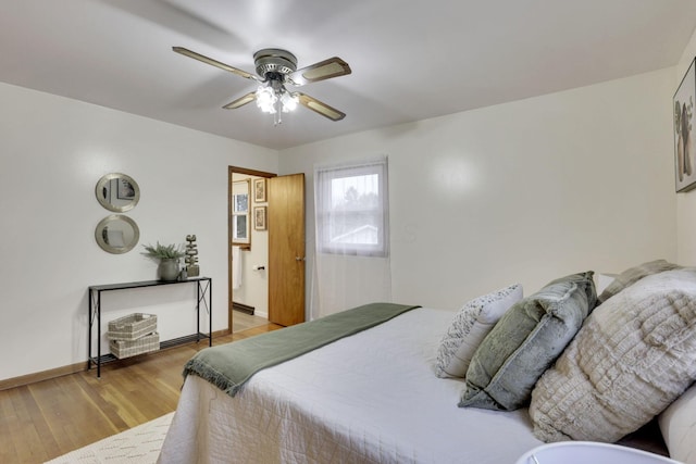 bedroom featuring ceiling fan and light wood-type flooring