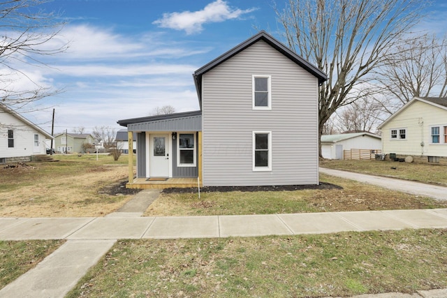 view of front of property with a front lawn