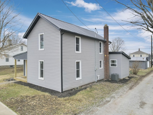 view of home's exterior featuring cooling unit