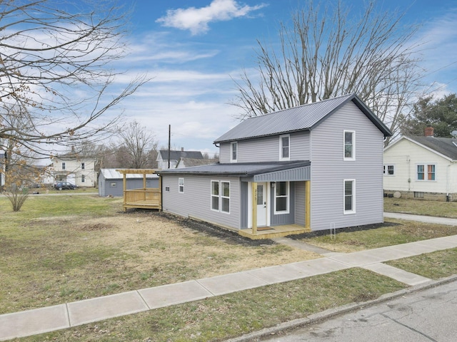 view of front of property with a front lawn