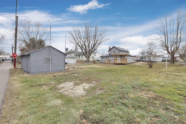 view of yard featuring a wooden deck