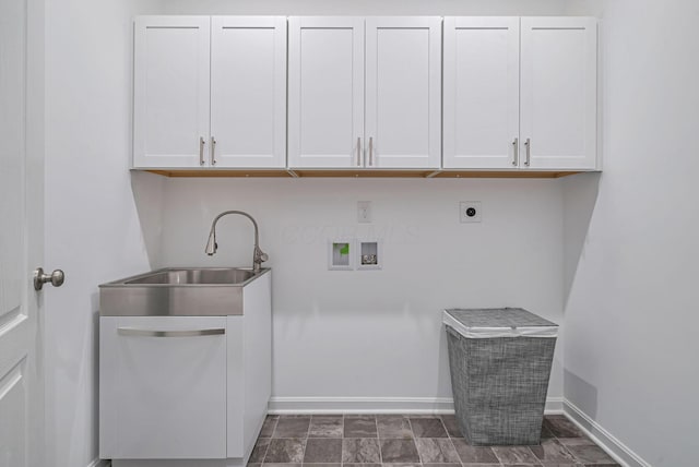 laundry room with cabinets, hookup for a washing machine, sink, and electric dryer hookup