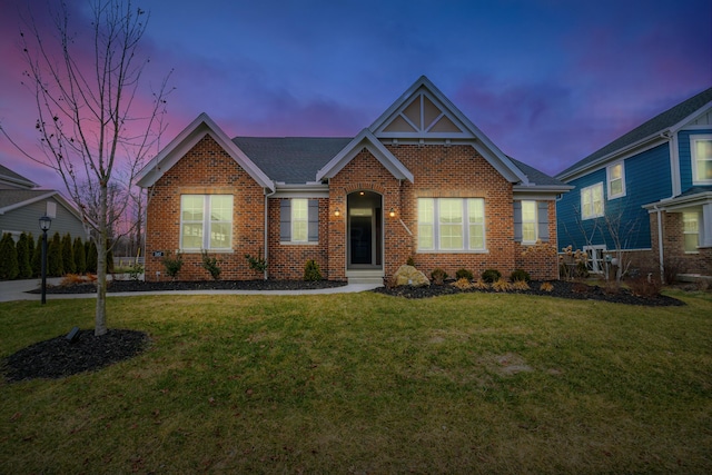 view of front of house with a lawn