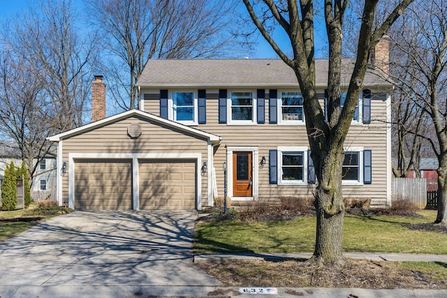 colonial home featuring concrete driveway, a chimney, a garage, and fence